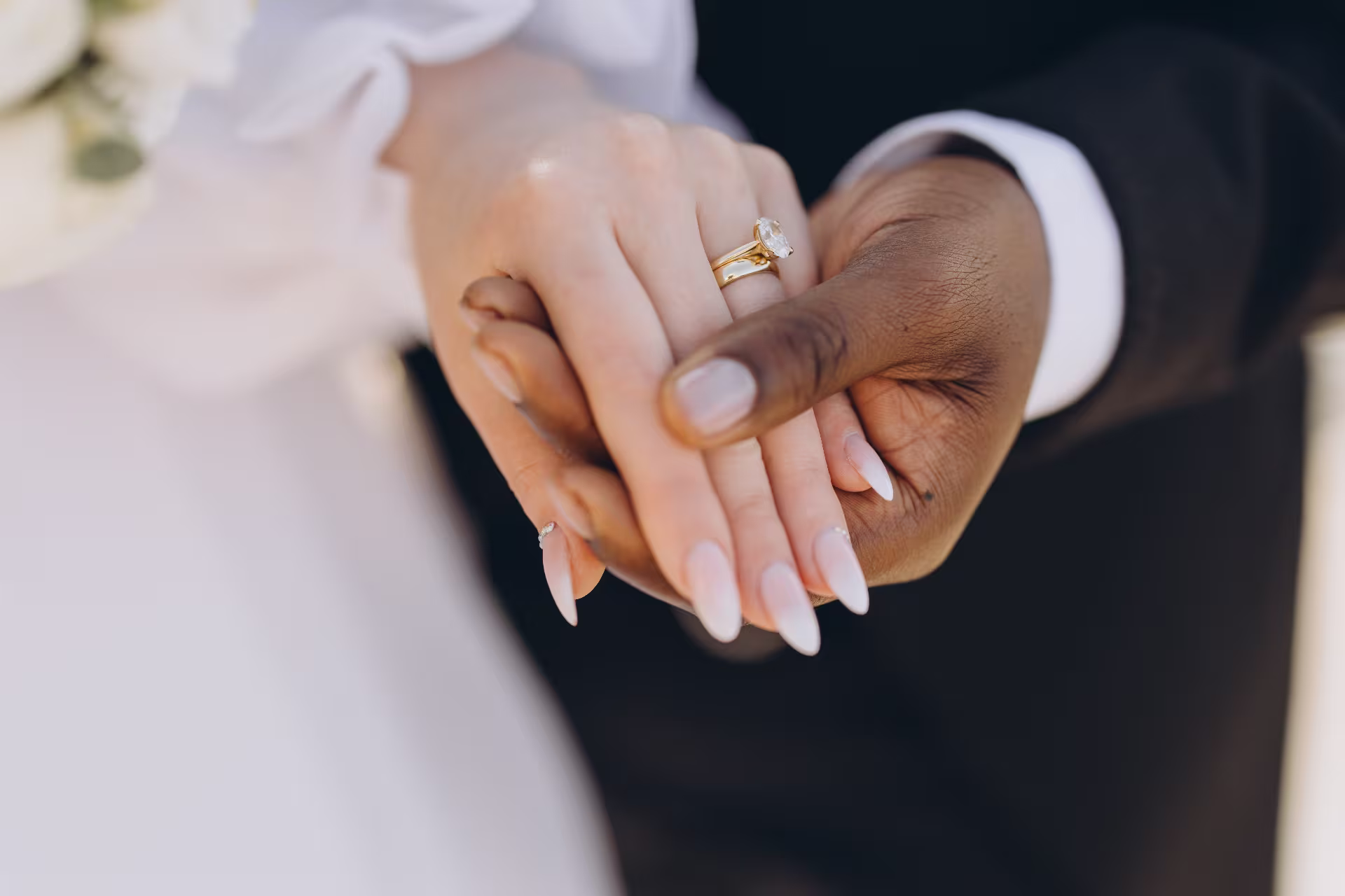 Bride and Groom Holding Hands